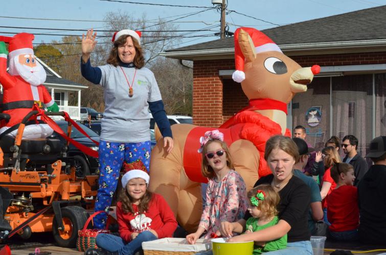 Santa gets ride on fire truck as Harmony Christmas season