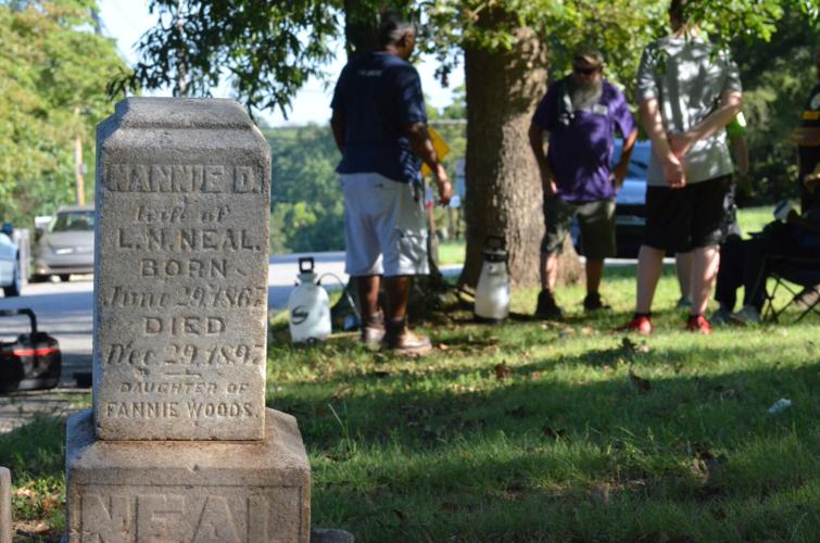 Preserving the past Volunteers apply elbow grease, love to headstones