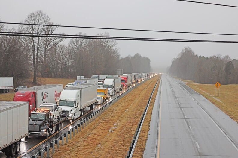 Downed trees closed both lanes of I 40 near Sharon School Rd