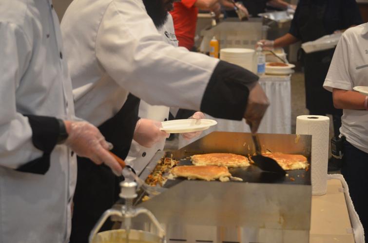 Making an investment Iredell's Happiest Day dishes up pancakes