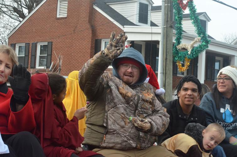 Harmony Christmas parade features floats, tractors and a few sheep