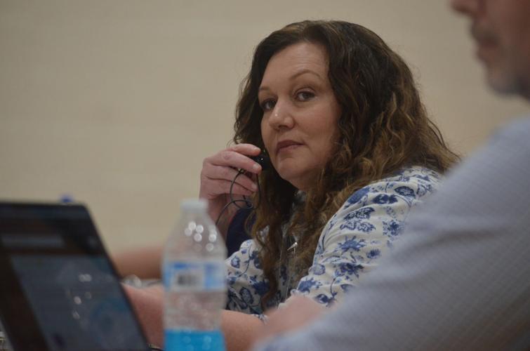 Anita Kurn speaks during the Iredell-Statesville Schools meeting at the Unity Center in Statesville on Friday.