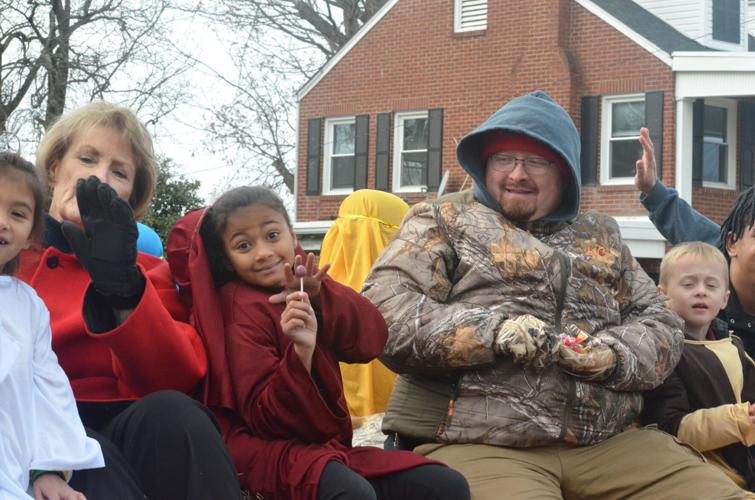 Harmony Christmas parade features floats, tractors and a few sheep