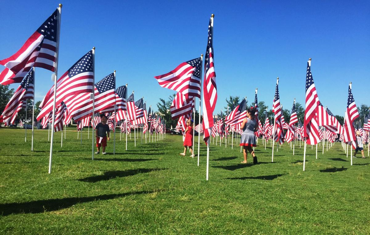 Hundreds gather at Field of Flags event in Mooresville News