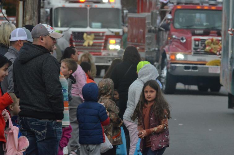 Harmony Christmas parade features floats, tractors and a few sheep