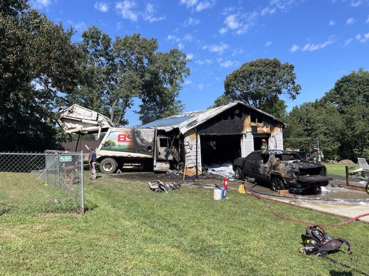 Statesville garage damaged by sanitation truck