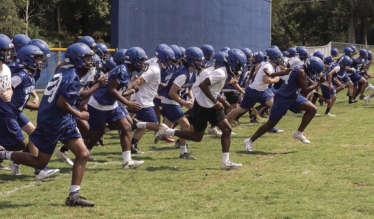 High School Football New Coach Evaluating Mooresville S Prospects