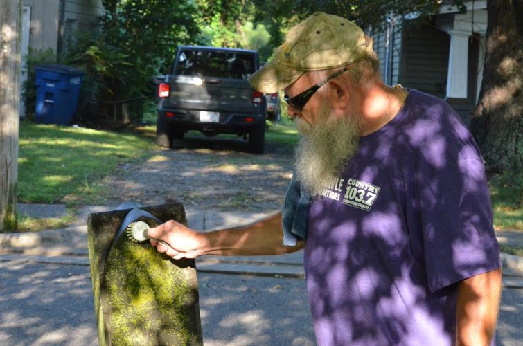 Preserving the past Volunteers apply elbow grease, love to headstones