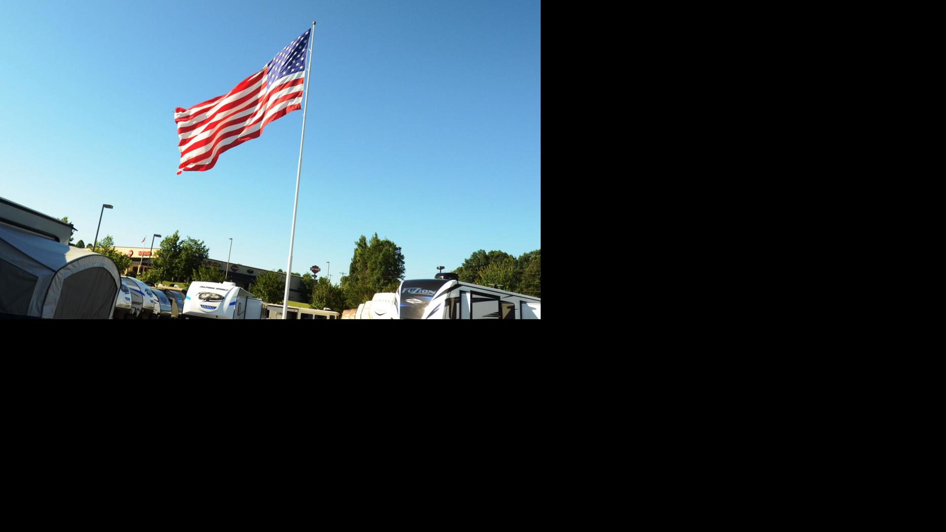 PHOTOS Camping World flag was lowered to honor veteran