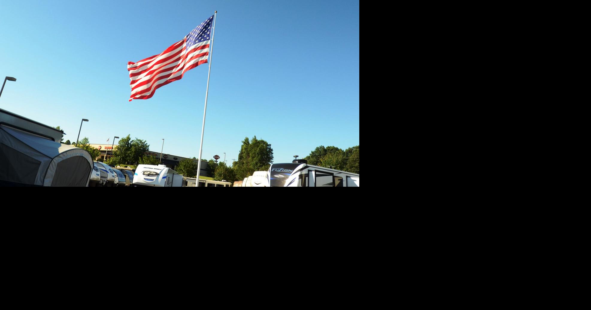 PHOTOS Camping World flag was lowered to honor veteran