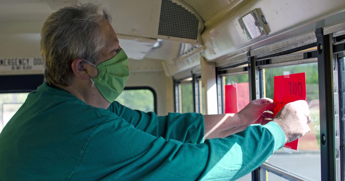 HELPING HANDS: Local bus drivers stay in touch with community, deliver ...