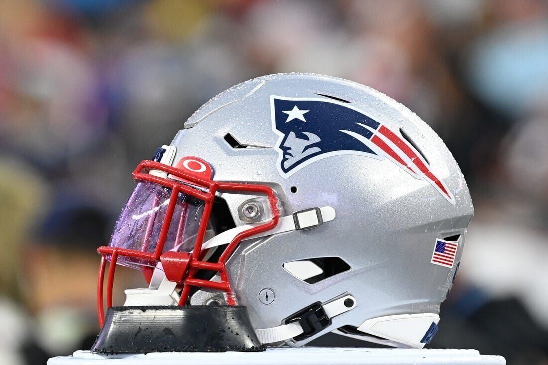 A San Francisco 49ers helmet sits on the sideline during an NFL