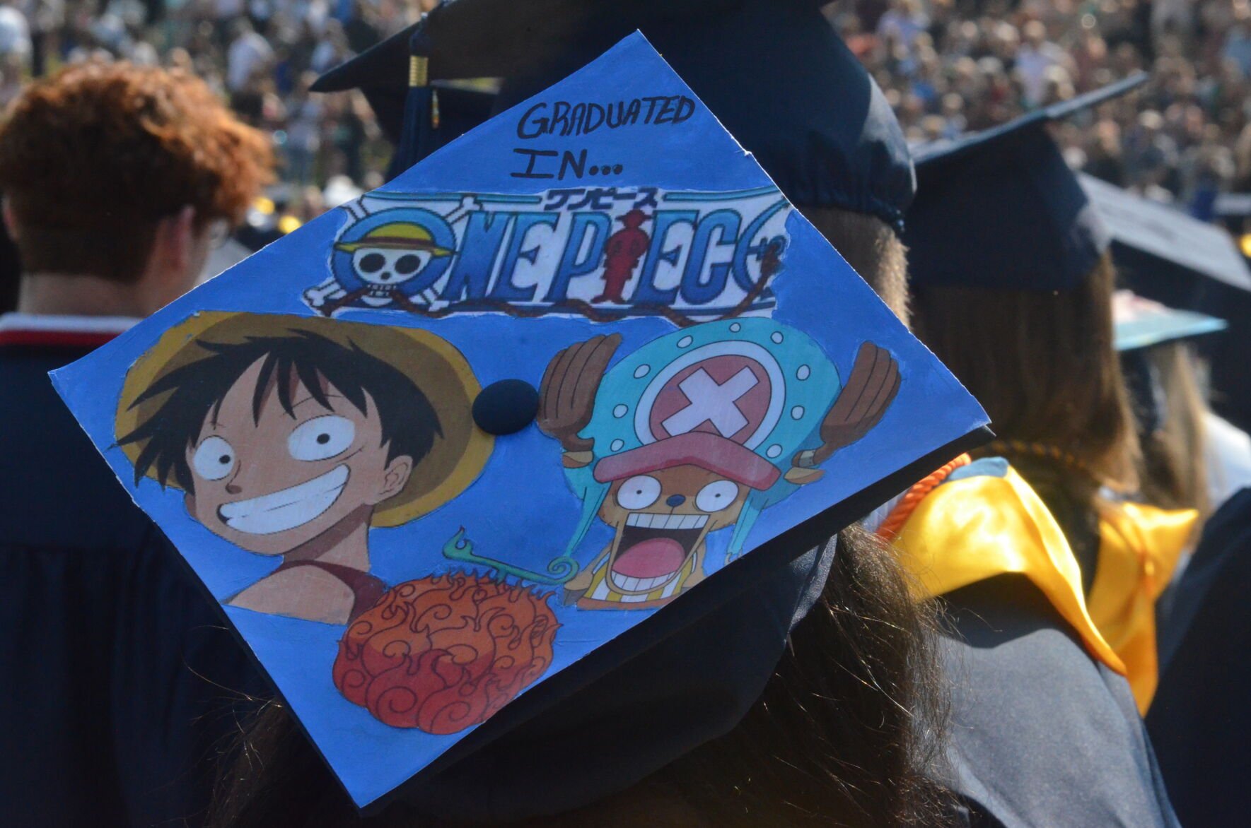 Another anime themed graduation cap! This one is based on our friend's  awesome YouTube series 2Kawaii4Comfort! : r/AnimeAnonymous