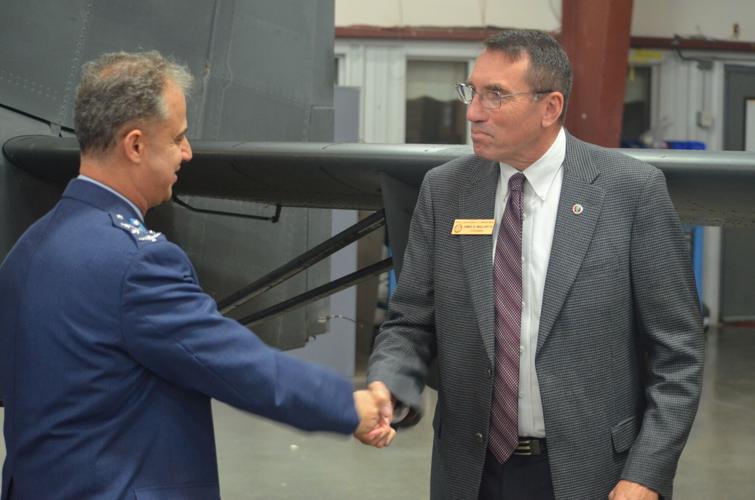 Iredell County Board of Commissioners chairman James Mallory, right, shakes hands with Brigadier General Mohammad Fathi Hiyasat, commander of the Royal Jordanian Air Force in Mooresville on Friday.