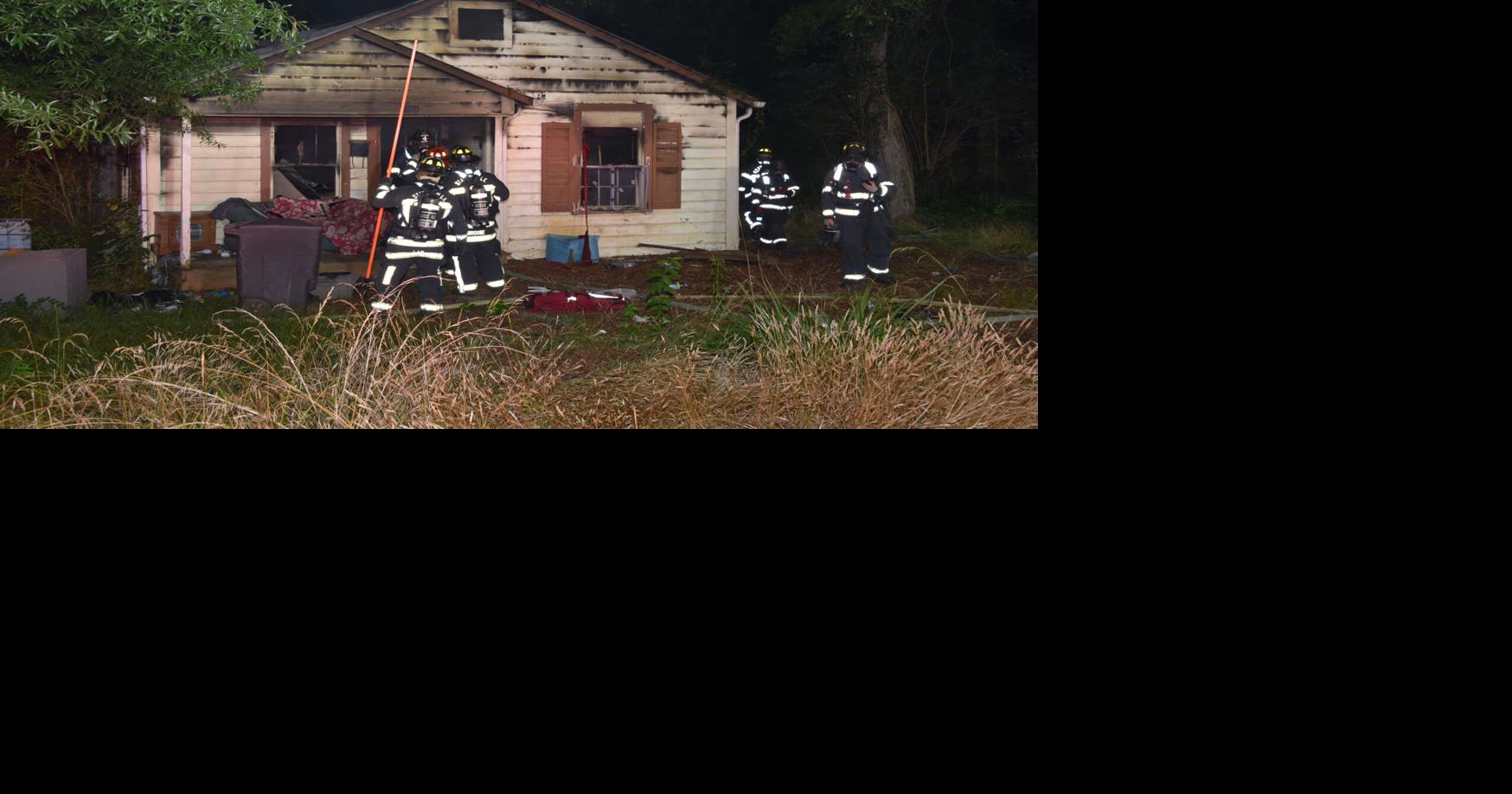 PHOTOS: Fire damages vacant home on 10th Street