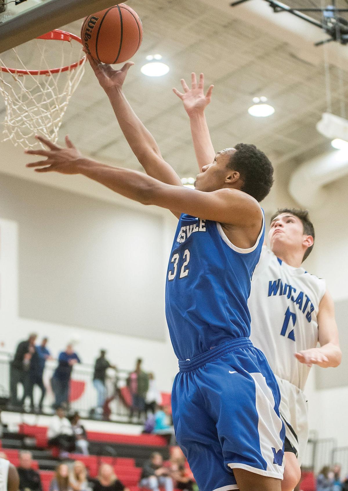 BOYS BASKETBALL Mooresville knocks off top seed Lake Norman to reach