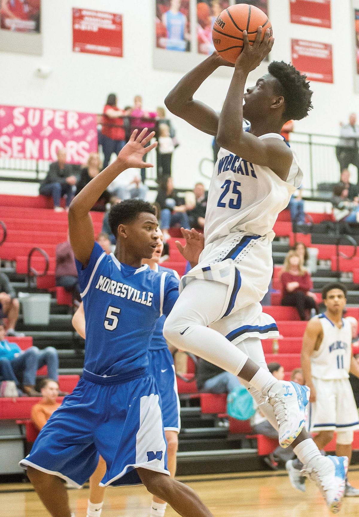 BOYS BASKETBALL Mooresville knocks off top seed Lake Norman to reach