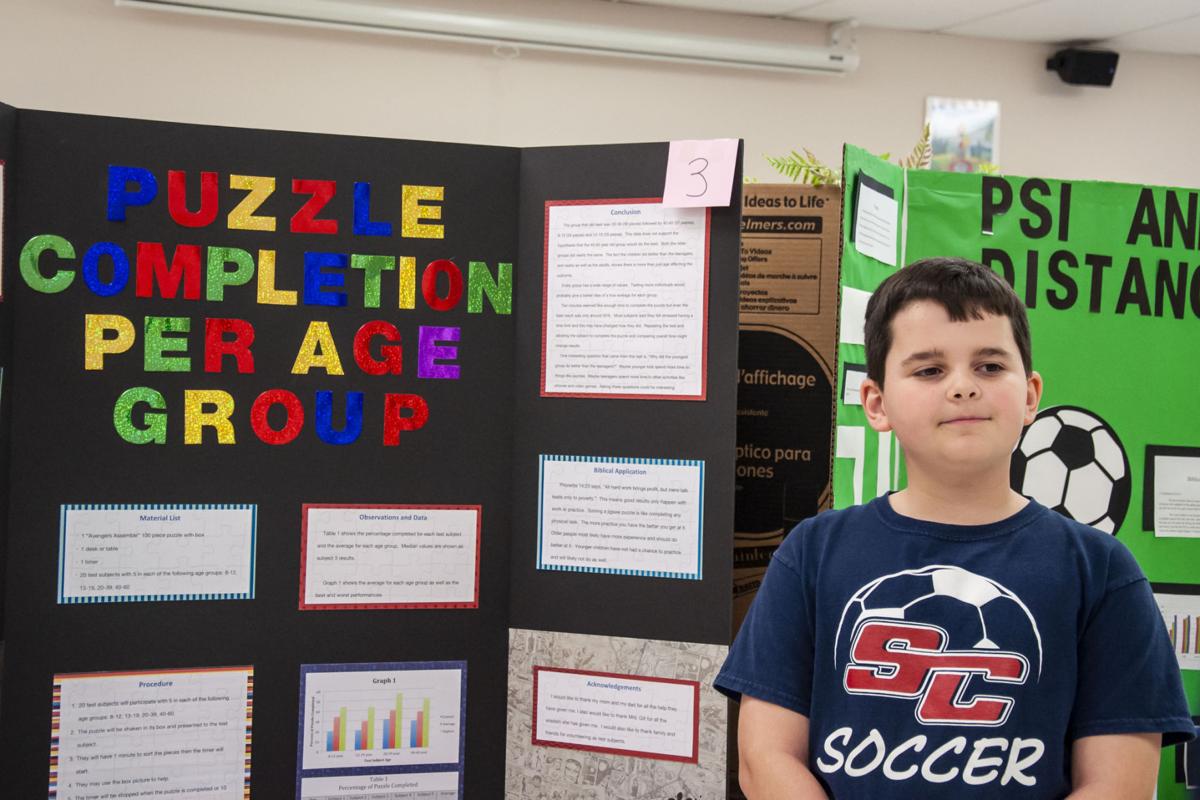 PHOTOS: Students present science projects at Statesville ...