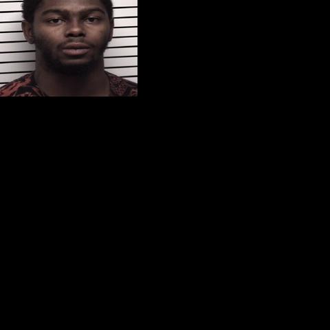 Two men arrested after drugs, stolen gun found in Statesville home