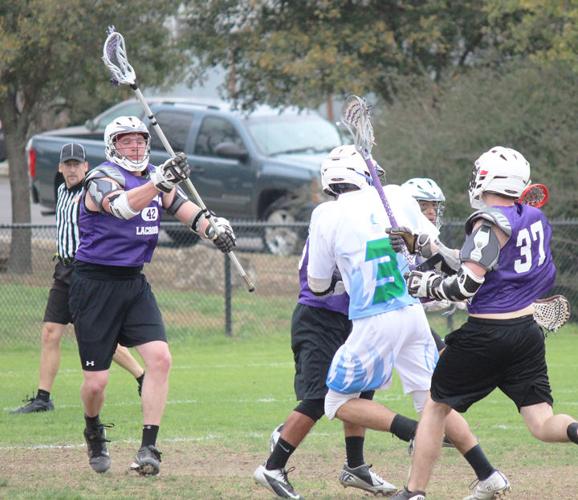 Runge grad at home on the field of lacrosse Archives