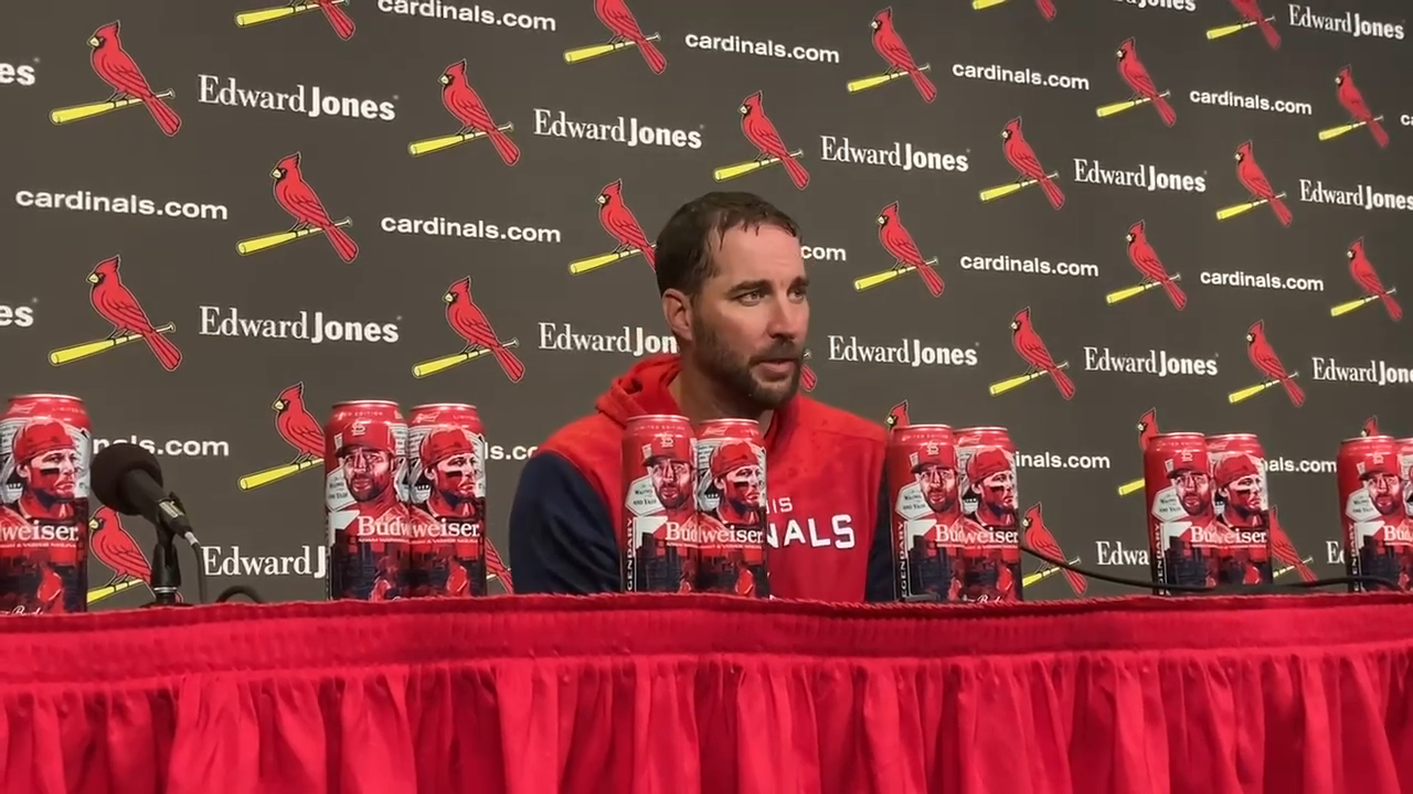 A curve, a keepsake, some Cherry Coke: How Cardinals Wainwright and Molina  made history