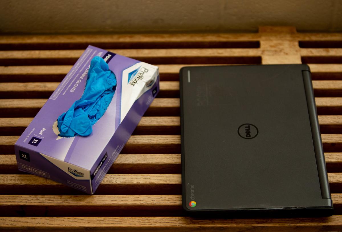 Chromebooks are passed out to Rockwood families as online learning begins this week