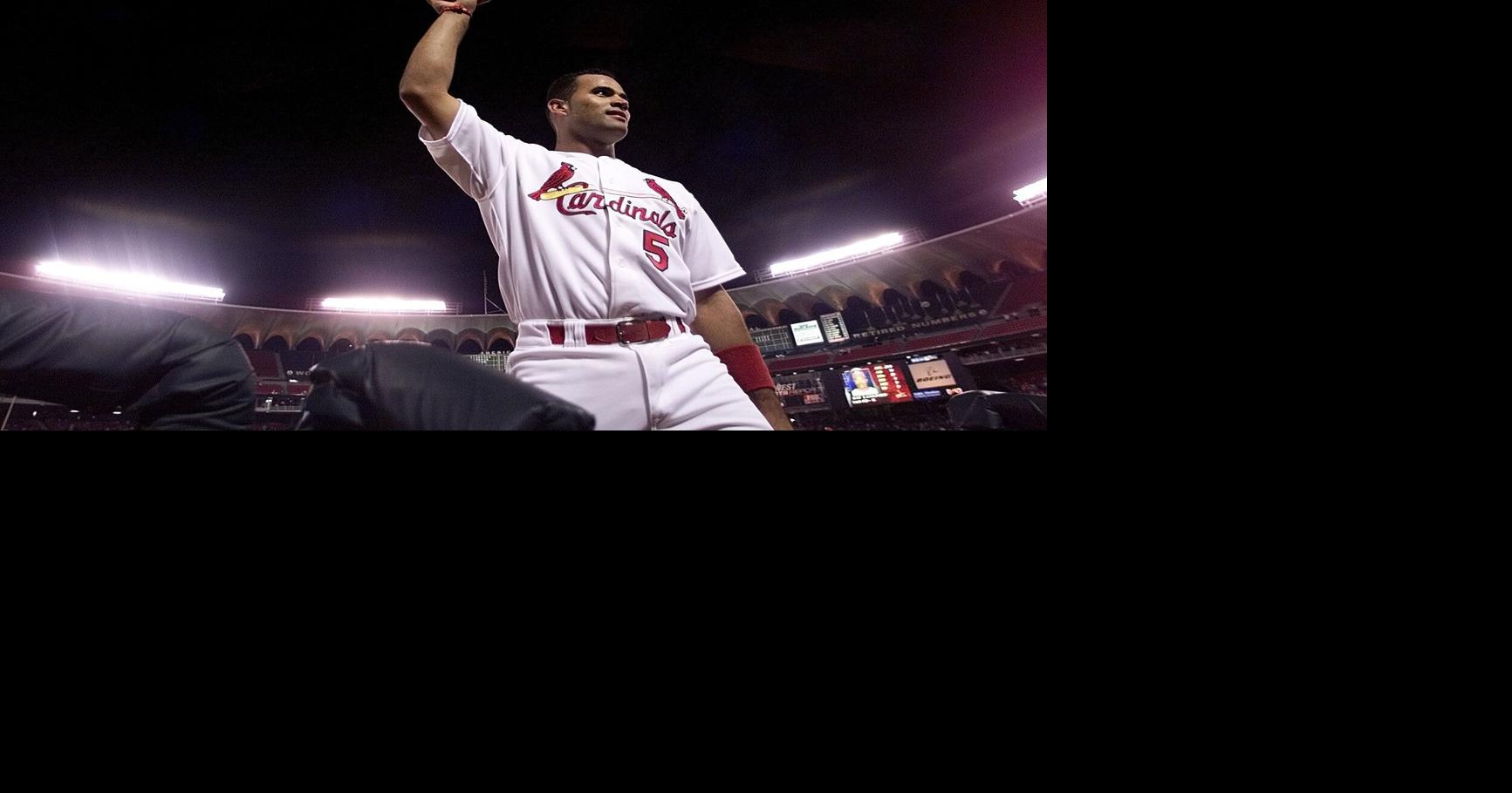 St. Louis Cardinals Albert Pujols watches a video tribute about