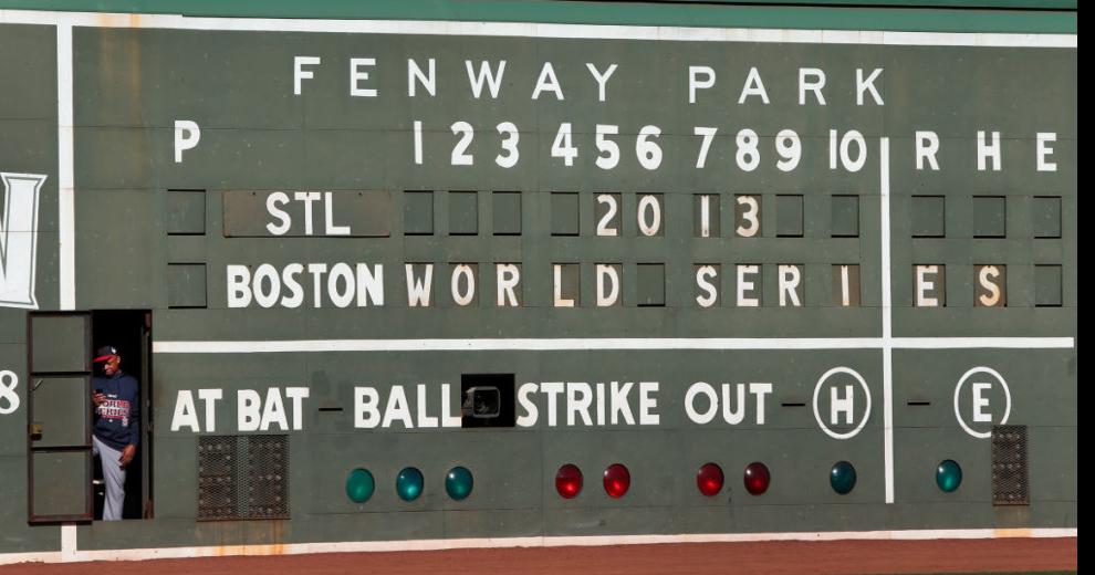 Ball gets stuck in light of Fenway Park's Green Monster scoreboard