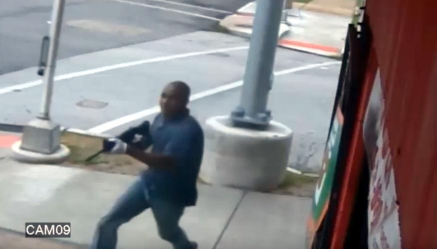 Gunman at Moma Minnie's Market