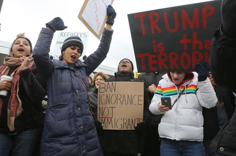 Protesters converge on Lambert over Trump policies