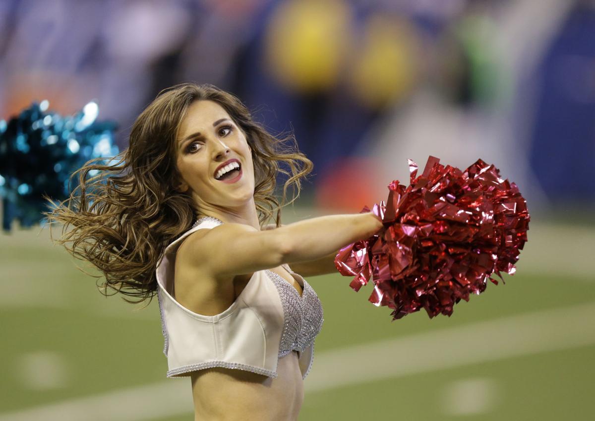 Scenes from the sidelines NFL cheerleaders wear pink for October NFL