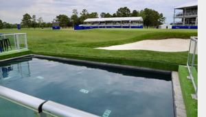 A temporary plunge pool was put in by the 18th green at Memorial Park.