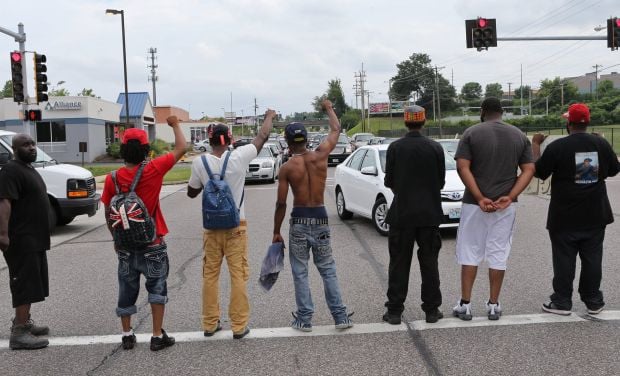 People protest the shooting of Michael Brown