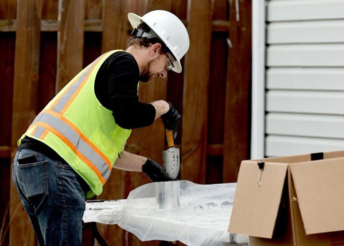 Testing for radiation under homes in Florissant