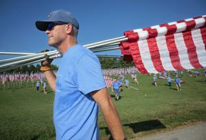 Flags of Valor memorial covers Art Hill in Forest Park