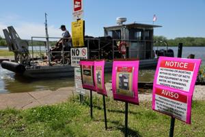 USGS collects nets and conducts research in effort to minimize invasive carp fish at Creve Coeur Lake