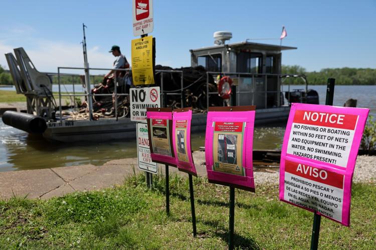 USGS collects nets and conducts research in effort to minimize invasive carp fish at Creve Coeur Lake