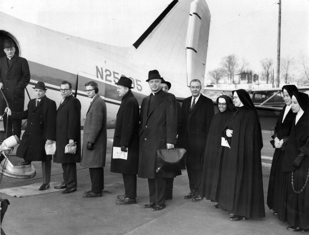 St. Louis clergy board plane for Selma in 1965