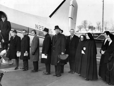 St. Louis clergy board plane for Selma in 1965