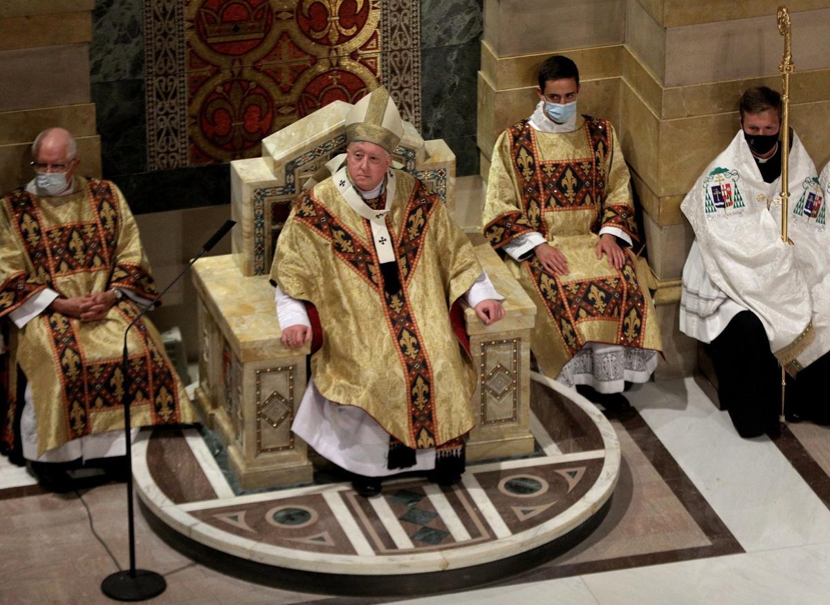 Archbishop Mitchell Rozanski (current)
