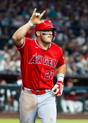 Mike Trout celebrates after hitting a solo home run against the Arizona Diamondbacks in the fifth inning at Chase Field on June 15, 2026.