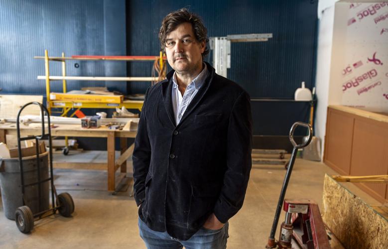 Mike Randolph among the construction of Nettie's Pizza Den