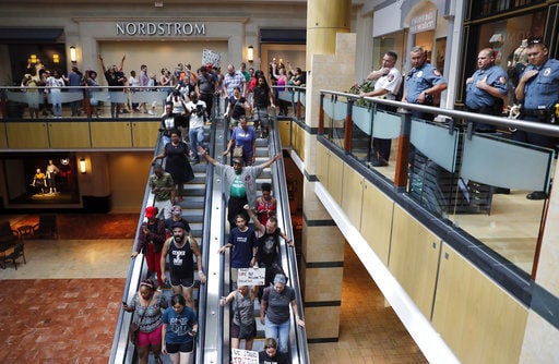 Protesters make good on threat to disrupt St. Louis business Protesters make good on threat to disrupt St. Louis business