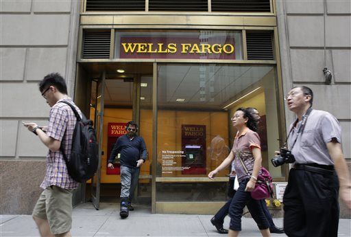 Wells Fargo profit edges lower in 2nd quarter