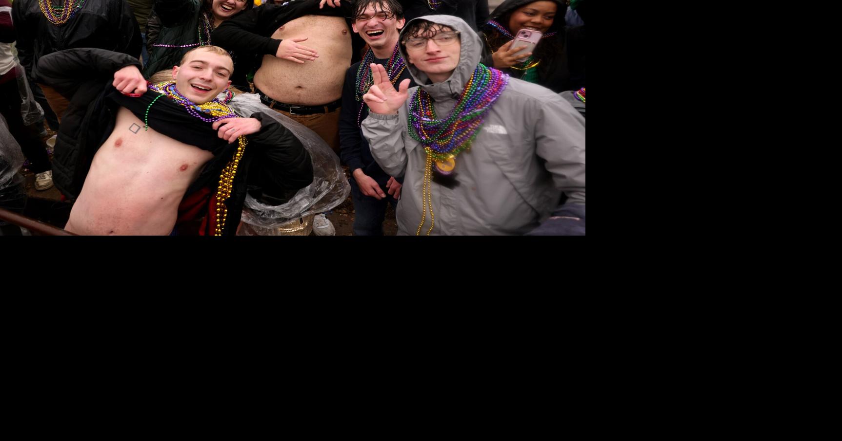 The 47th Mardi Gras Parade rolled through the Soulard neighborhood Saturday. Thousands of people lined the streets despite a steady rain that fell throughout the day.
