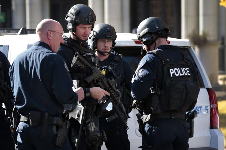 Armed man shot, killed by officers in ѿý apartment complex near Forest Park