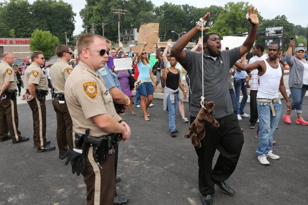 People protest the shooting of Michael Brown