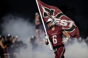 Photos: St. Charles West 21, Holt 14