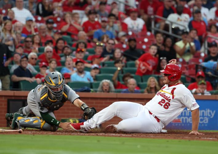 Cardinals, back after long absence, sweep White Sox