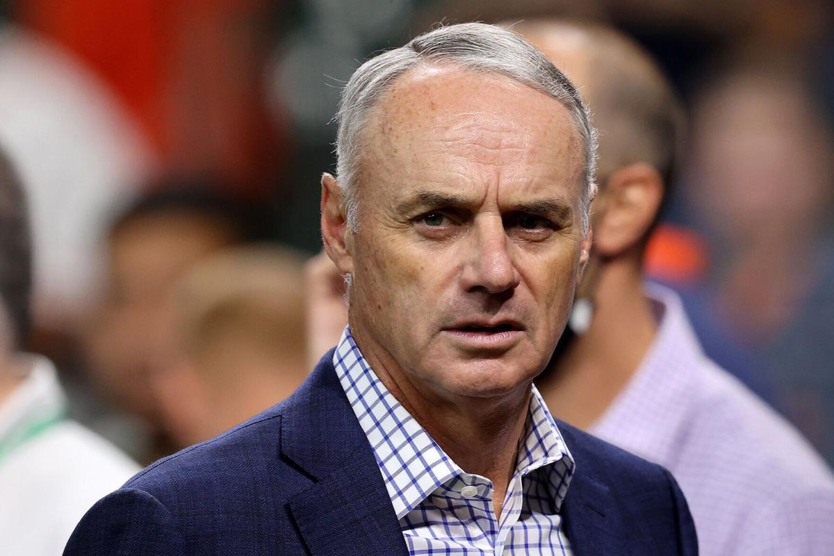 In this file photo, Major League Baseball Commissioner Rob Manfred looks on prior to Game 1 of the World Series between the Atlanta Braves and the Houston Astros at Minute Maid Park on Oct. 26, 2021 in Houston.